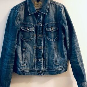 Blue jean jacket. Small tear in elbow